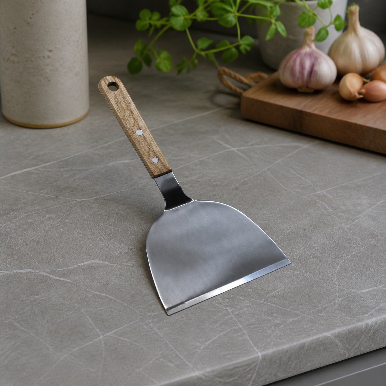 Stainless steel flat turner with silver blade and brown wooden handle