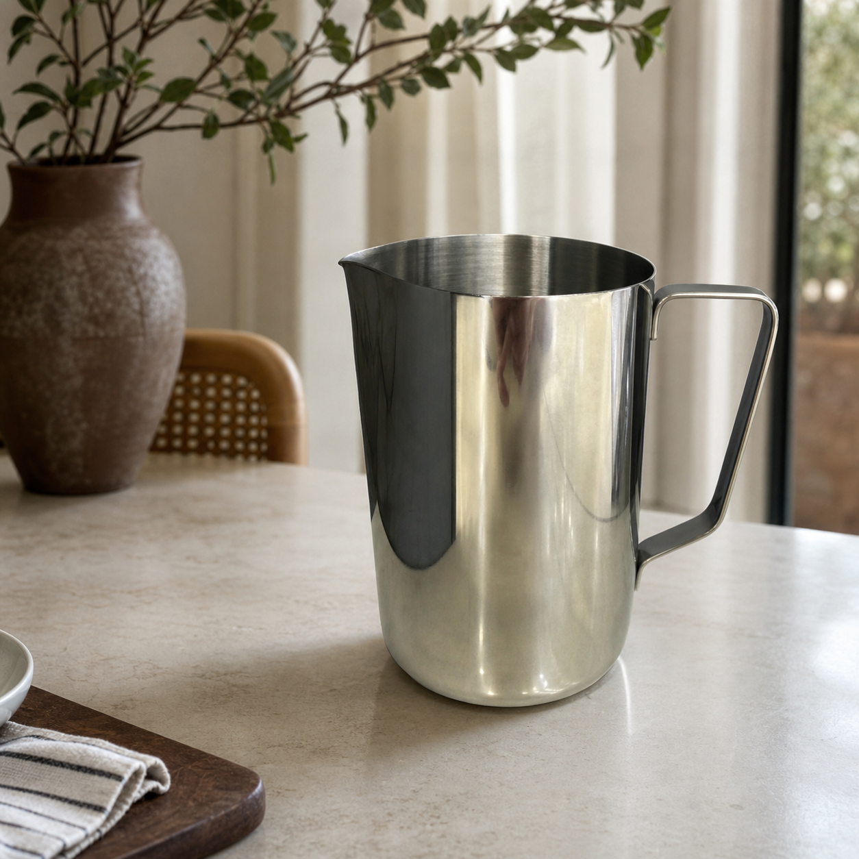 Stainless steel serving pitcher with spout, 900 ml, in silver