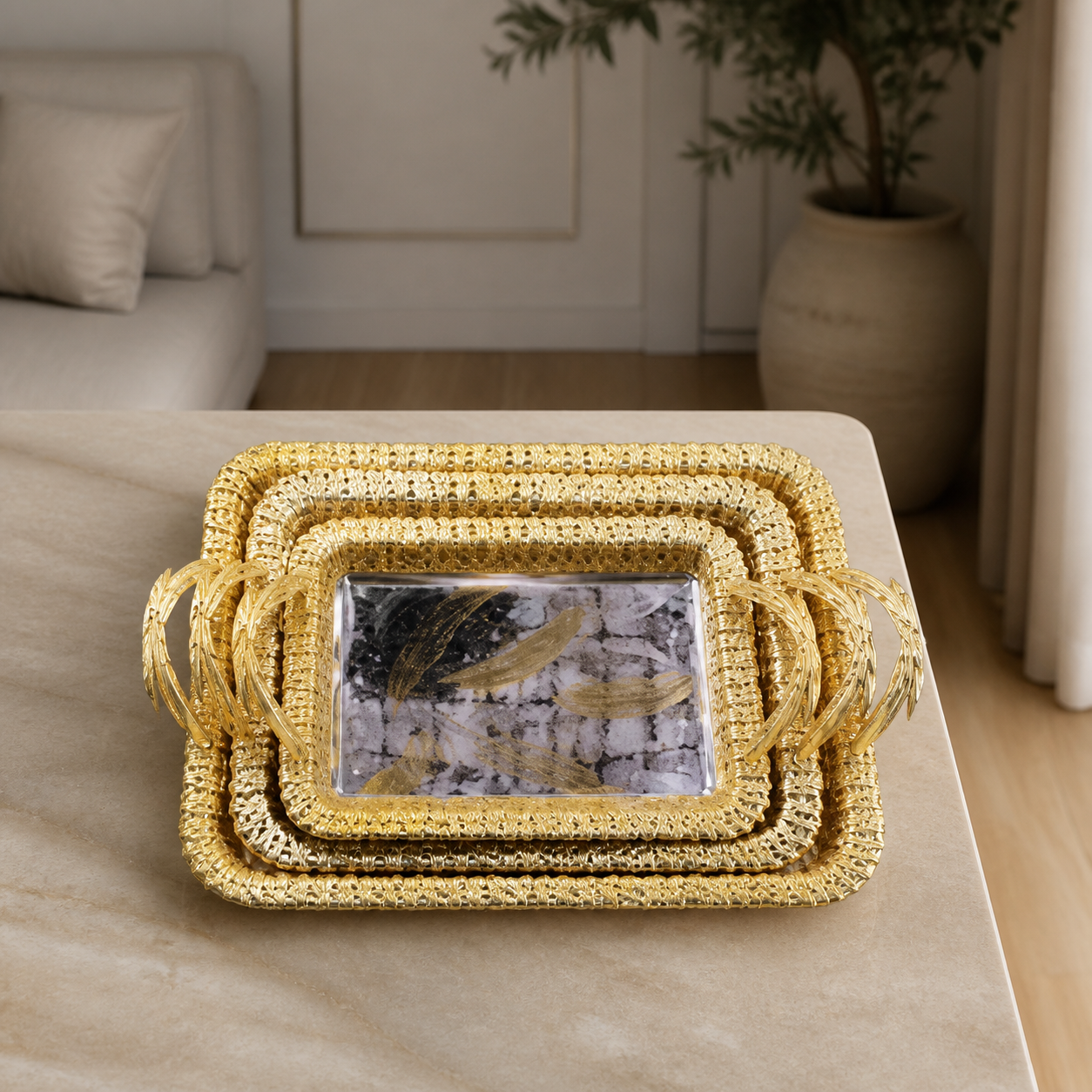 Gold and silver stainless steel serving tray set, three pieces
