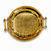 Round gold-tone stainless steel serving tray with two ornate openwork handles and an engraved centre medallion
