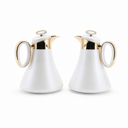 Pair of matching white dallah coffee flasks with gold-tone spout, handle and lid rings