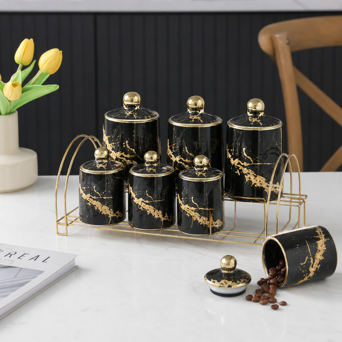 Black and gold ceramic spice and seasoning jar set on a gold-tone rack