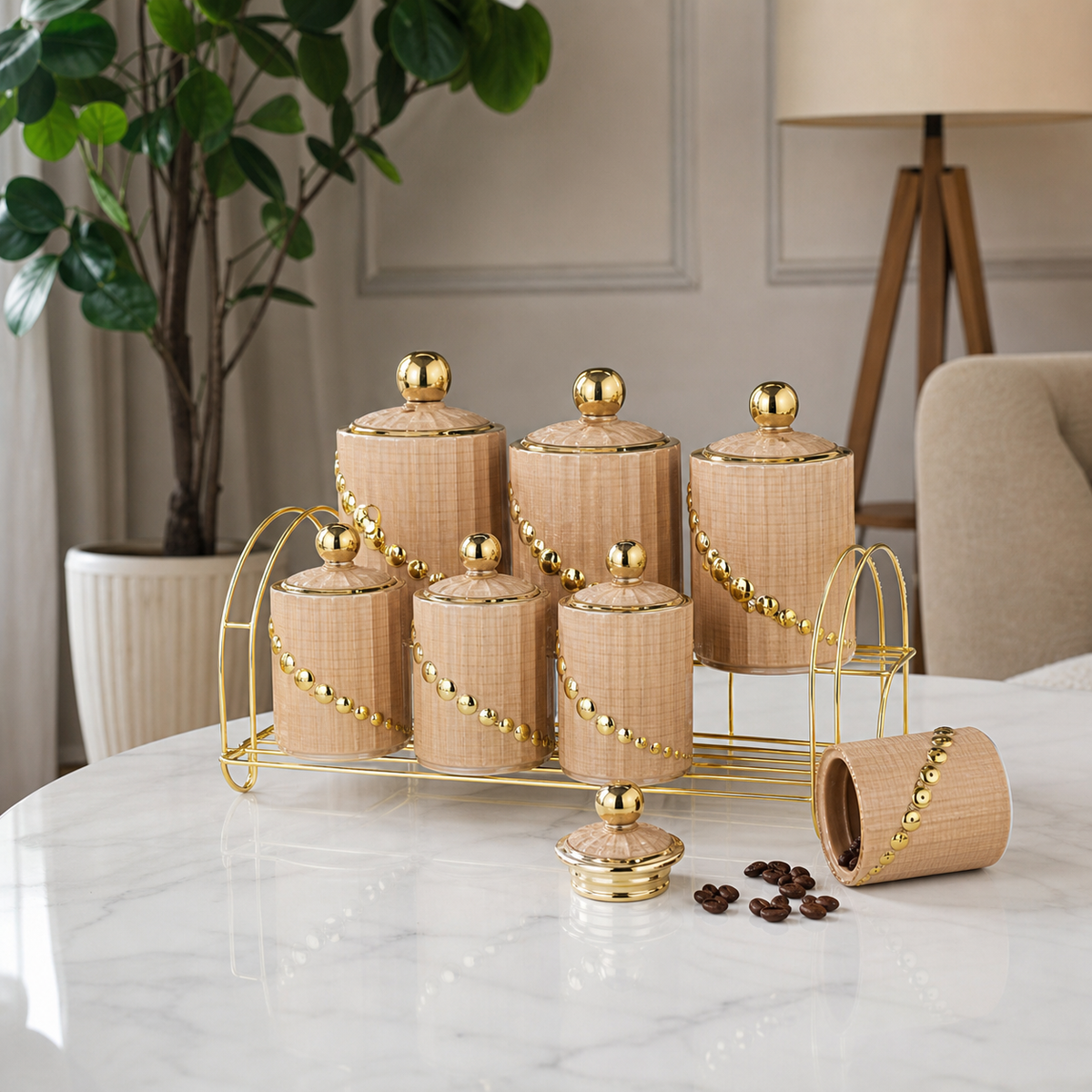Beige jar set with fine woven texture, round gold bead trim and fluted lids, on a gold-tone rack