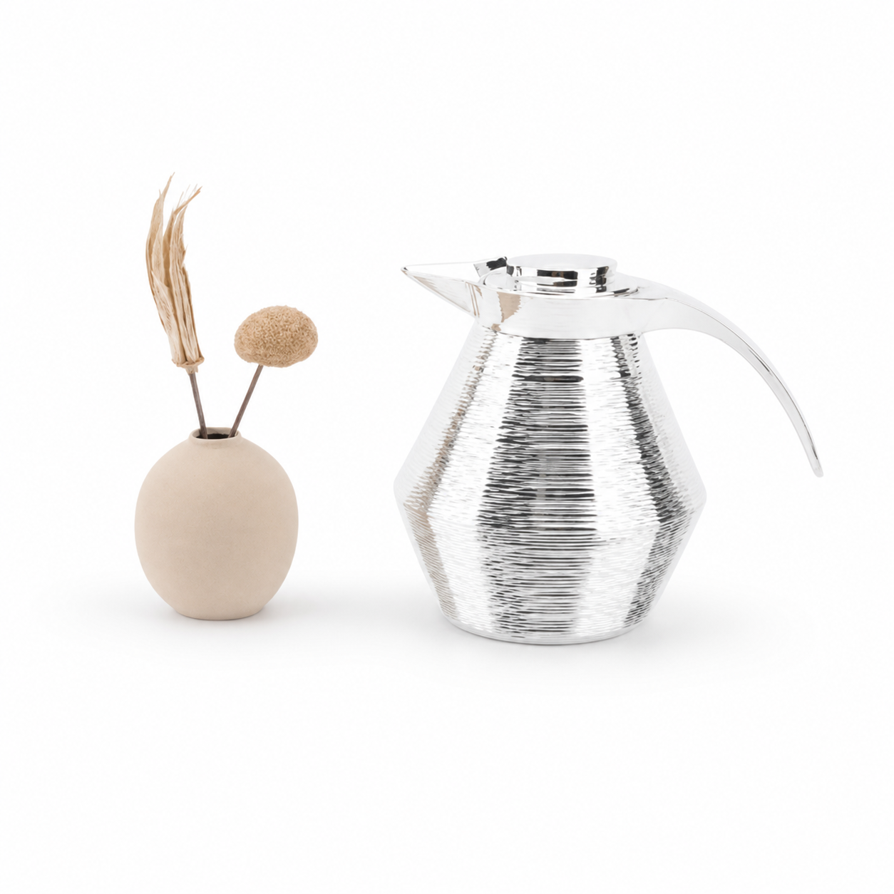 Silver flask with a ribbed body