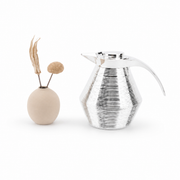 Silver flask with a ribbed body