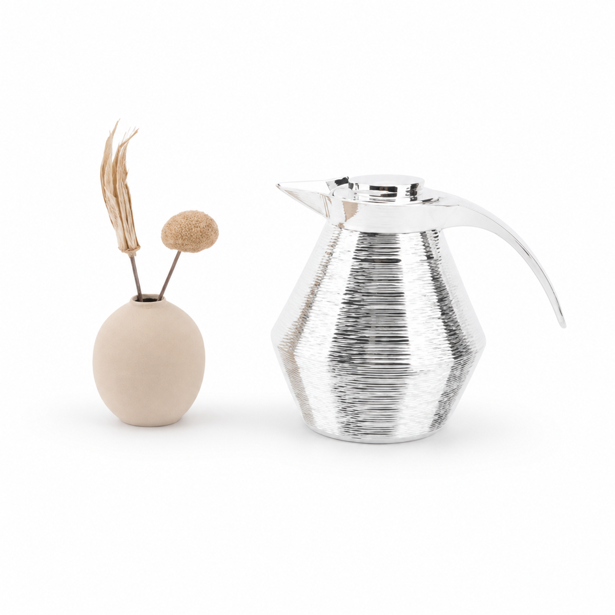 Silver flask with a ribbed body
