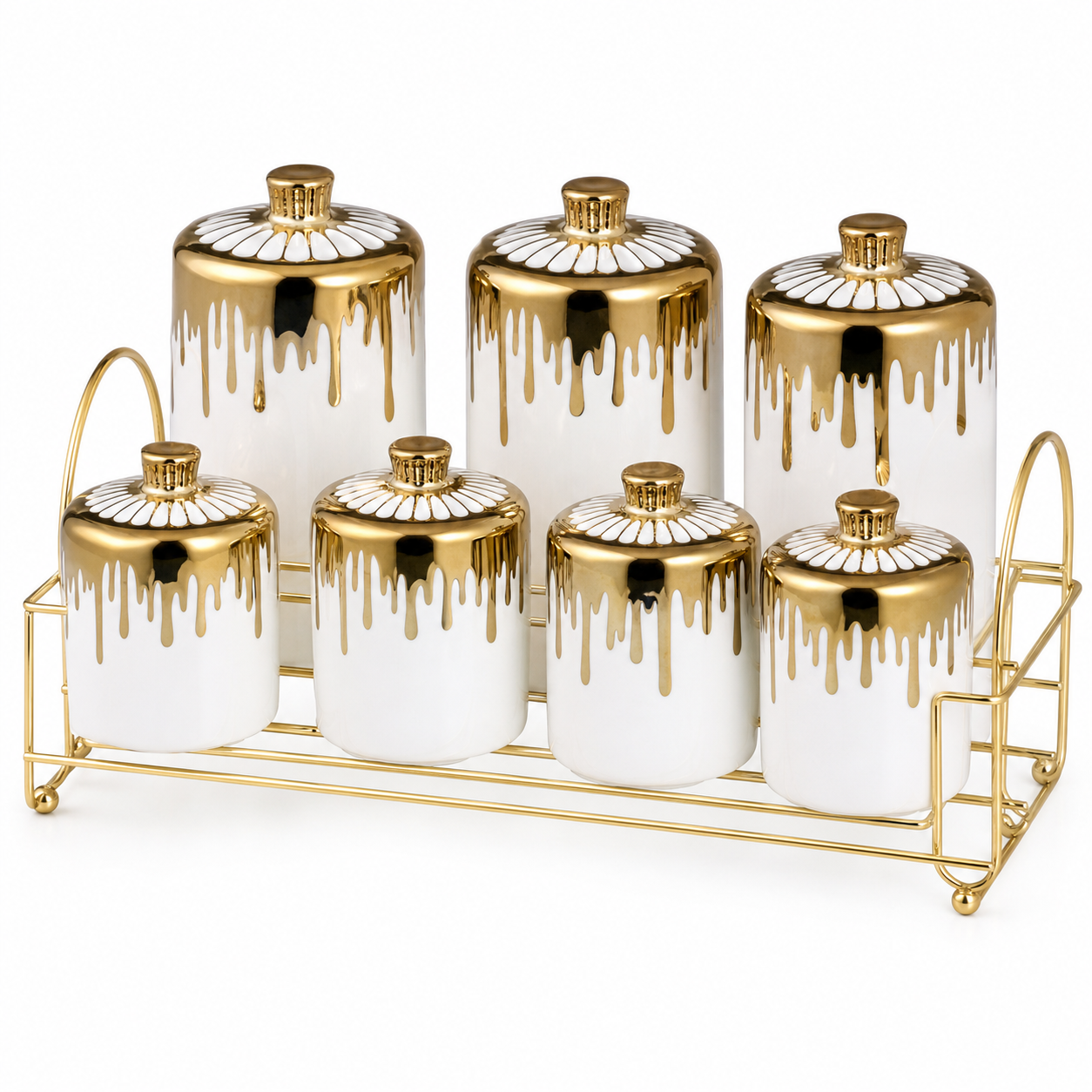 Seven white ceramic spice jars with gold drip-glaze lids on a gold-tone rack