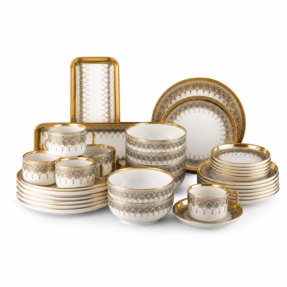 White ceramic dinnerware set with gold rims and a scalloped gold-and-grey lattice band