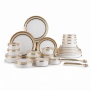 Ivory ceramic dinnerware set with wide brushed-gold rim bands and a fine Greek-key border, plates and lidded bowls