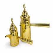 Two gold-tone stainless steel coffee pots, pierced lids with crescent-and-star finials, straight side handles