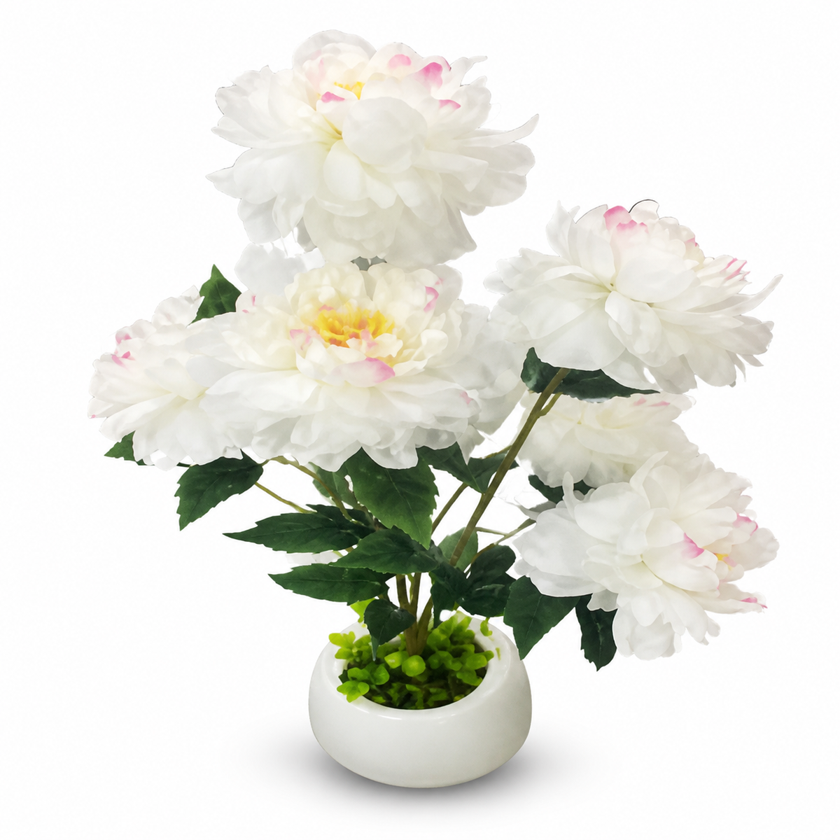 White and ivory artificial peonies arranged in a white vase