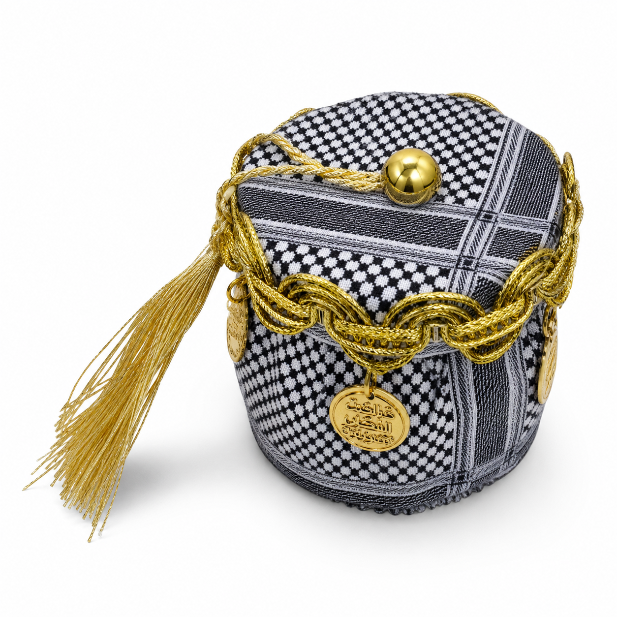 Keffiyeh-print favor basket in black and white with gold-tone coins and tassels