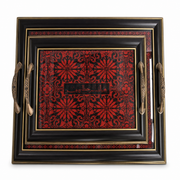 Two-piece black tray set with gold pinstripes and a red-and-black patterned centre panel
