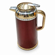 Red insulated flask with gold-tone lid, spout, handle and engraved silver neck band