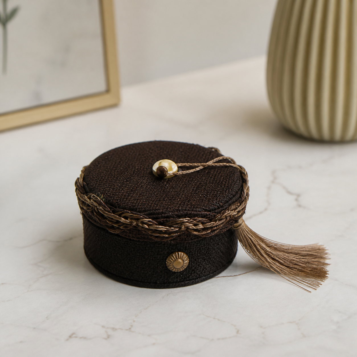Round brown decorative candy favor container with tassel