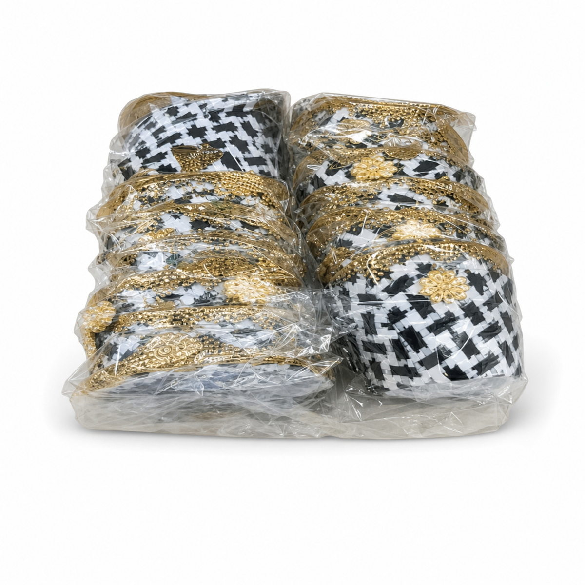 Stacked black-and-white houndstooth candy favors with gold trim, sealed in a clear bulk bag