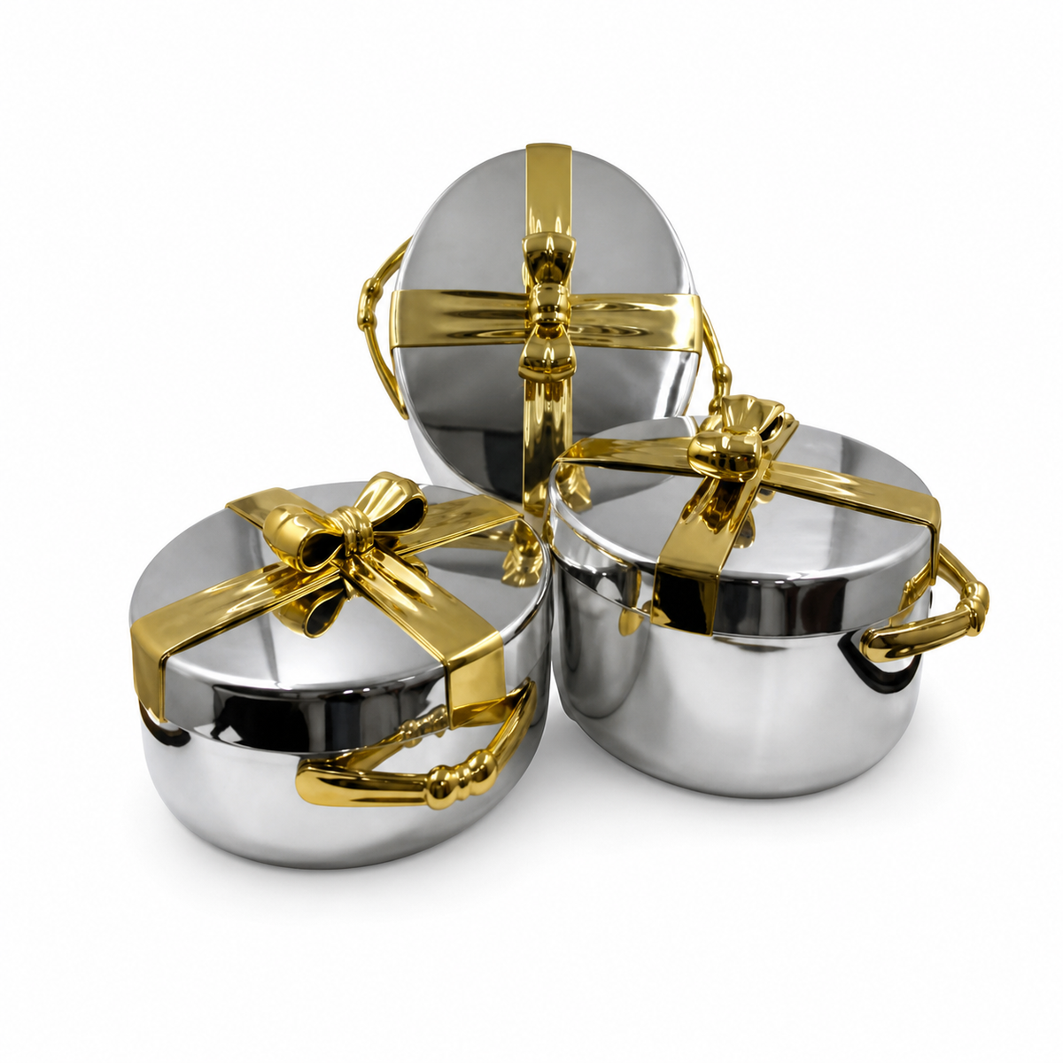 Three silver casserole food warmers with gold ribbon-bow lids and gold handles