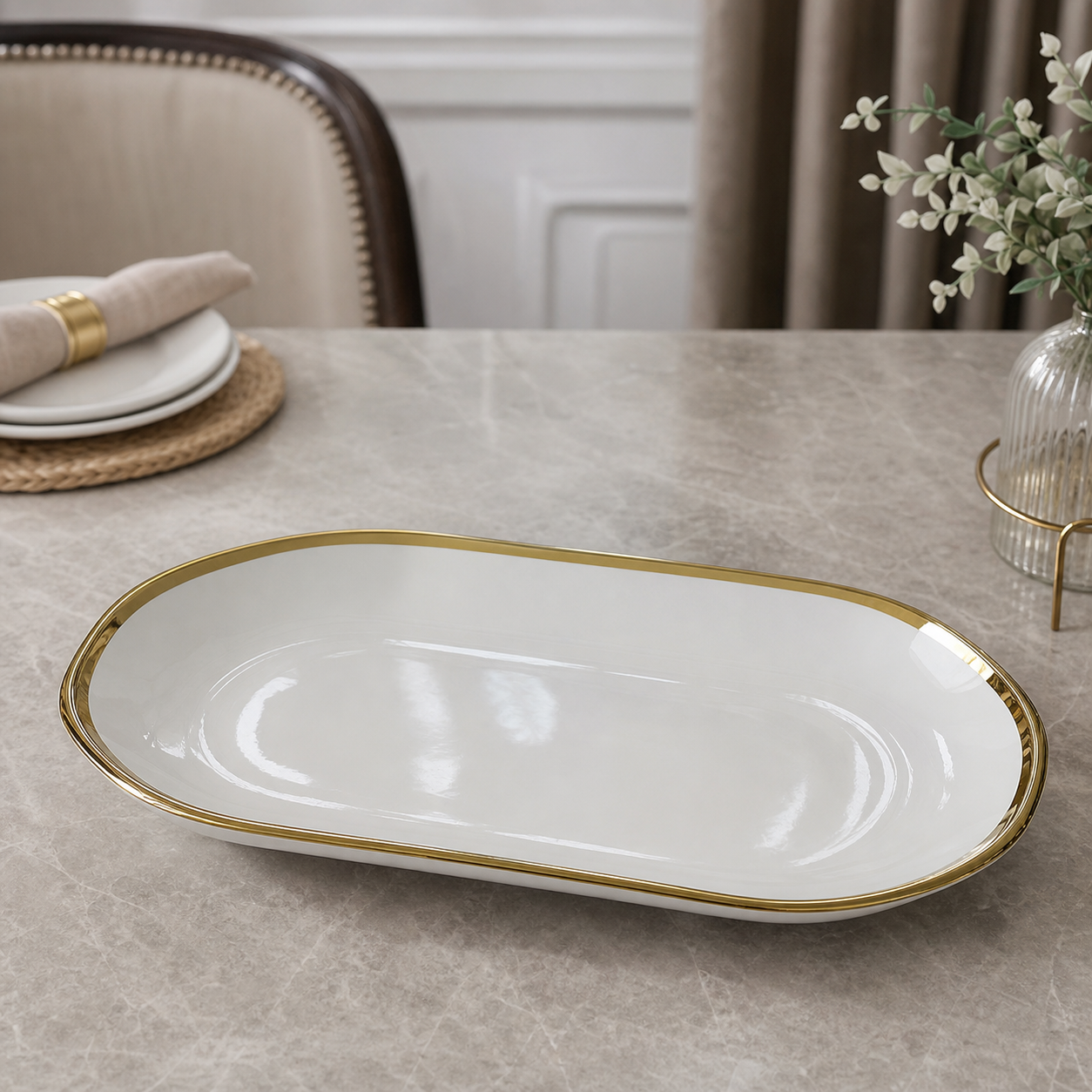White ceramic oval serving plate with gold rim, 32 cm
