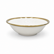 White ceramic bowl with gold rim, 7 inches