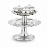 Silver stainless steel two-tier serving stand with three domed covered dishes on a footed pedestal base