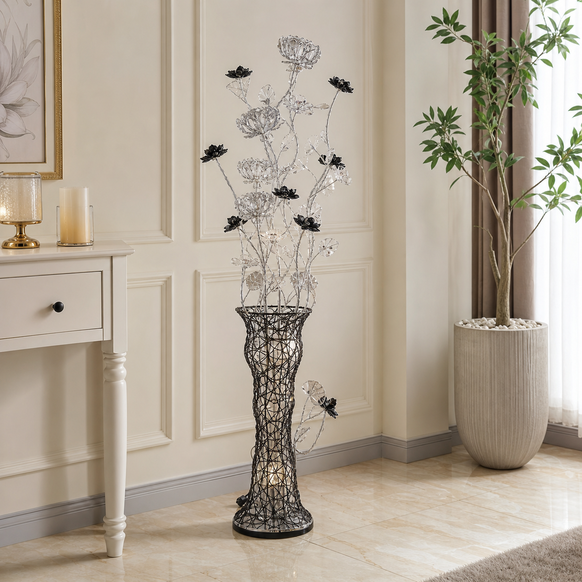 Dark wire-mesh vase lamp, lit from within, with clear beaded blossoms and black flowers