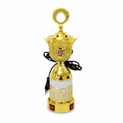 Gold electric incense burner with a ring finial above a white gold-filigree base band, on white