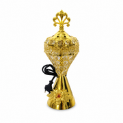 Gold electric incense burner with ornate finial and round base
