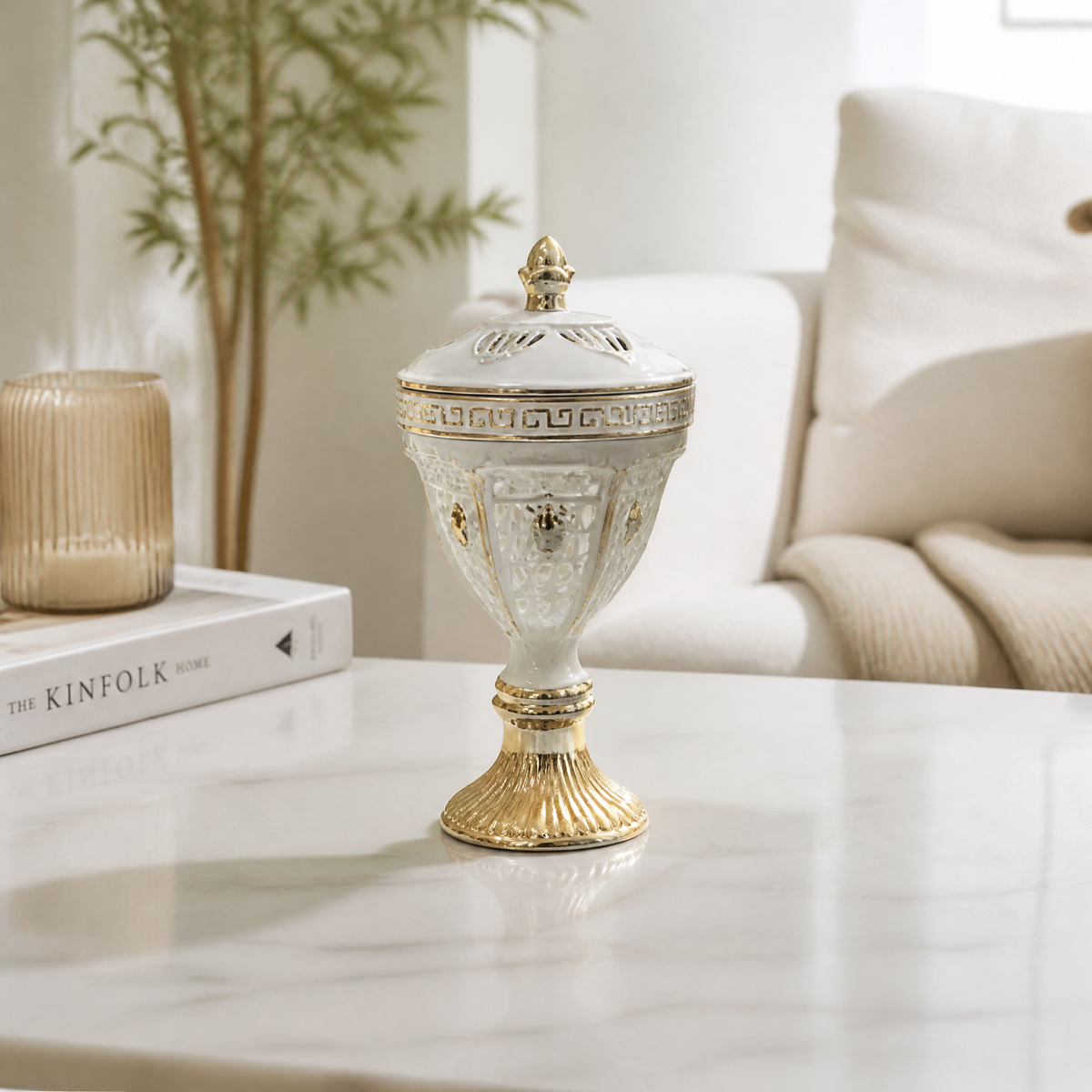 White and gold lidded decorative burner on a pedestal base