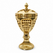 Gold lidded decorative burner on a pedestal base