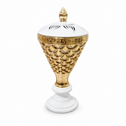 White and gold lidded decorative burner on a pedestal base with a pierced pattern