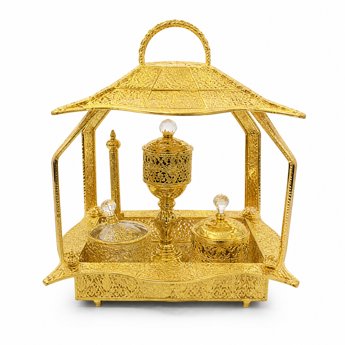 Gold pavilion-shaped burner display set with bottles on a tray base