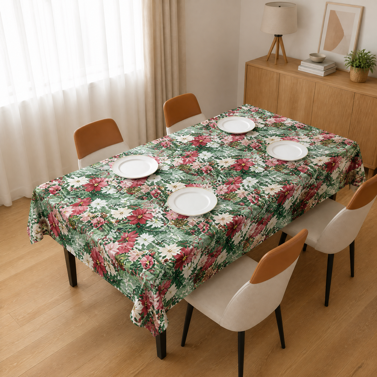 Red and white floral table roll fabric dressed over a dining table in a furnished dining room