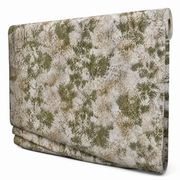 Table roll in a mottled olive-green and cream print, 1.37 m x 20 m, partly unrolled