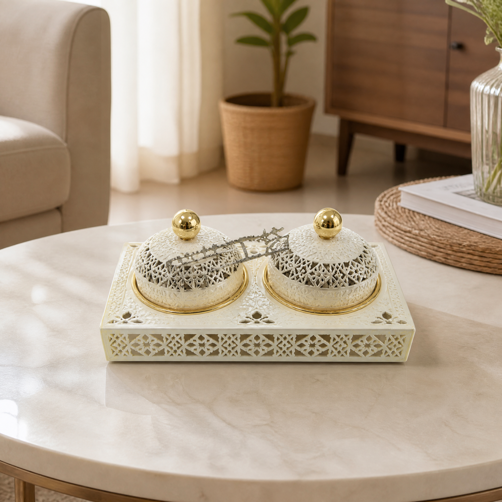 White and gold candy tray with two small lidded gold-topped jars