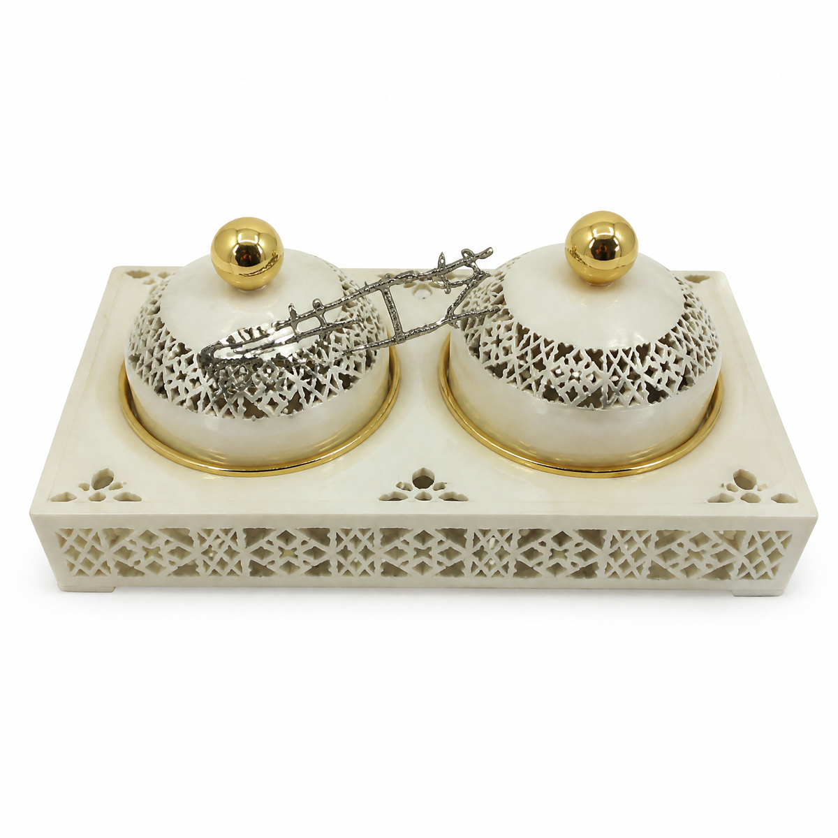 White and gold candy tray with two small lidded gold-topped jars