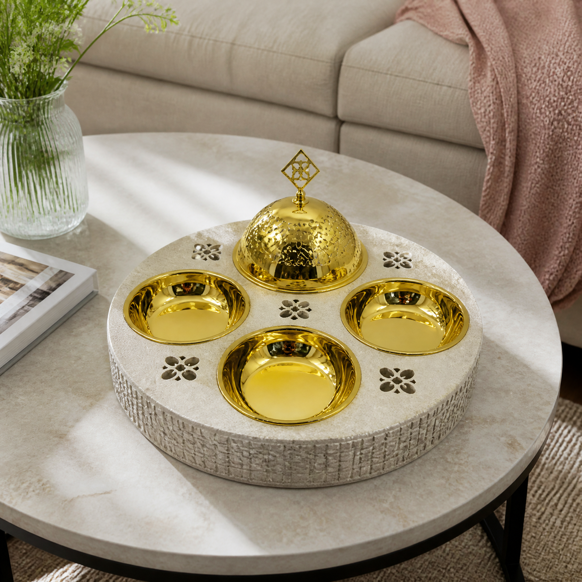 Cream tray with three gold-tone bowls and a hammered gold-tone domed lid, shown on a living-room table