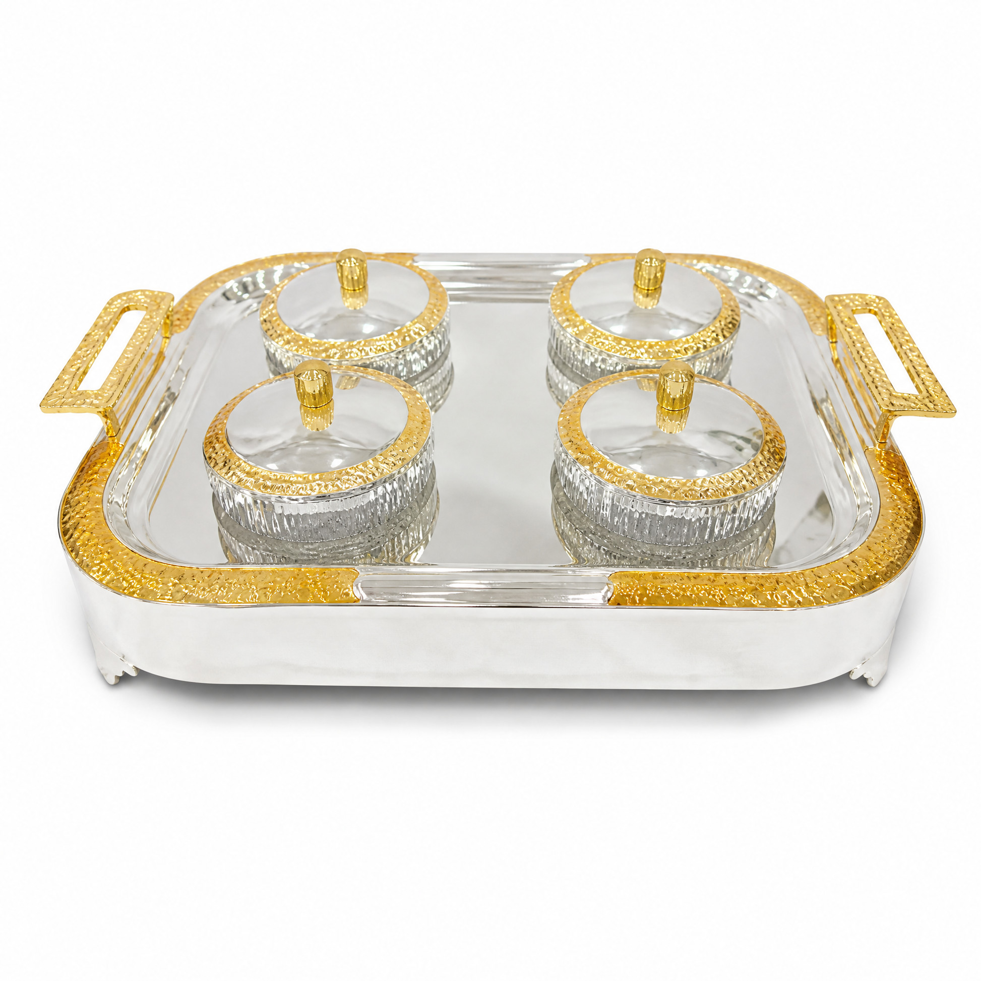 Rectangular silver tray with gold handles holding four ribbed glass bowls with gold-rimmed lids