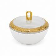 Small white bowl with a clear lid, pierced gold rim band and a gold loop knob