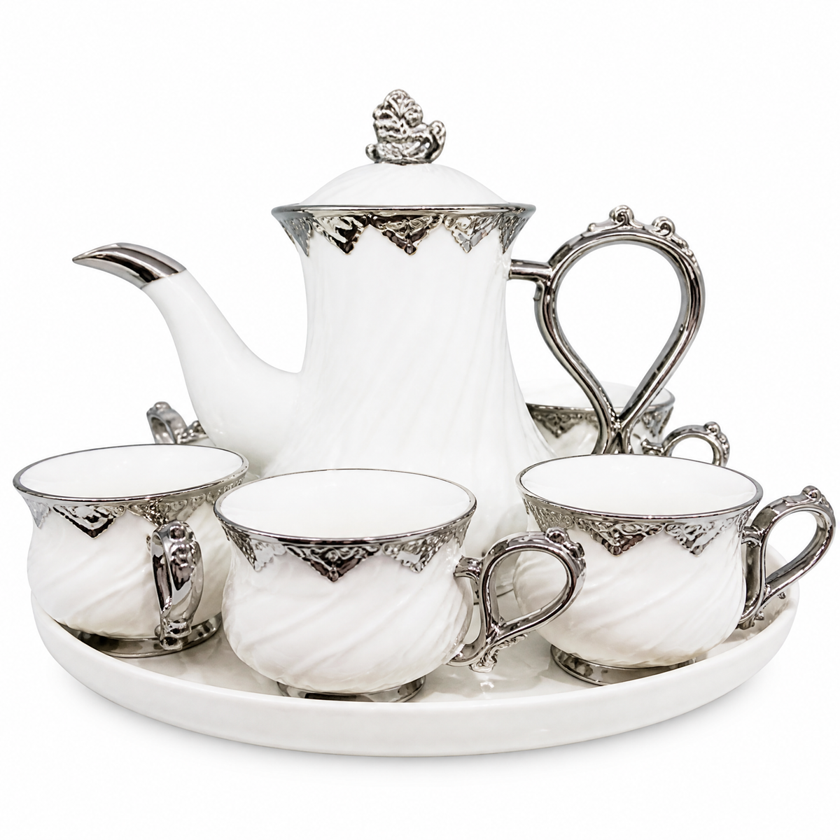 Gold and white tea service with a lidded teapot cups and a tray