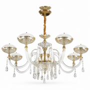 Large gold chandelier with white domed shades on curved glass arms and hanging crystal strands